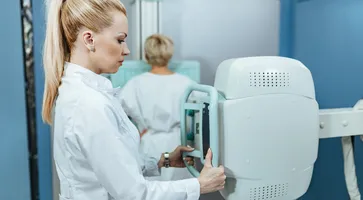 https://ognikubani.ru/wp-content/uploads/2023/03/female-doctor-taking-xray-of-a-patient-in-examination-room-at-the-hospital