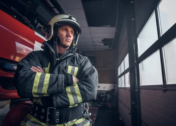 https://ognikubani.ru/wp-content/uploads/2023/01/a-brave-fireman-wearing-protective-uniform-standing-next-to-a-fire-engine-in-a-garage-of-a-fire-department-crossed-arms-and-looking-sideways