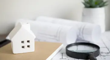 https://ognikubani.ru/wp-content/uploads/2023/01/house-and-notebook-near-magnifying-glass-and-drafts_1