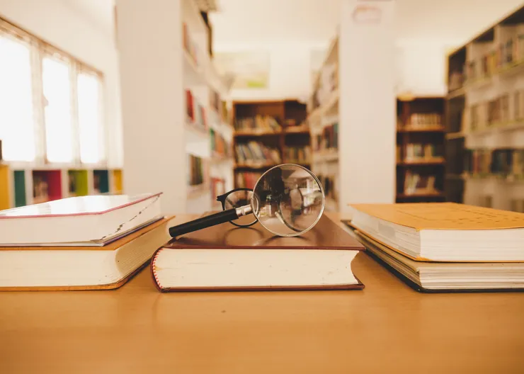 https://ognikubani.ru/wp-content/uploads/2023/01/book-in-library-with-old-open-textbook-stack-piles-of-literature-text-archive-on-reading-desk