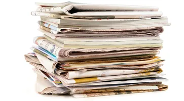 stack-old-newspapers-magazines
