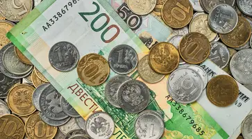 https://ognikubani.ru/wp-content/uploads/2023/03/money-coins-and-banknotes-in-russian-rubles-scattered-in-a-heap-on-the-table-top-view-idea-for-background-or-banner-for-market-news