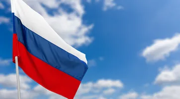 https://ognikubani.ru/wp-content/uploads/2023/02/russian-flag-against-blue-sky_1