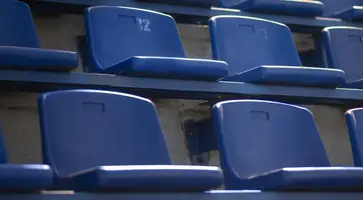 empty-blue-grandstands-low-angle