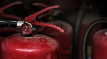closeup-red-fire-extinguishers