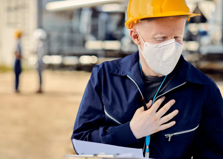 https://ognikubani.ru/wp-content/uploads/2023/03/albino-construction-worker-with-face-mask-holding-his-chest-in-pain-while-working-outdoors