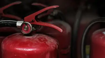 closeup-red-fire-extinguishers