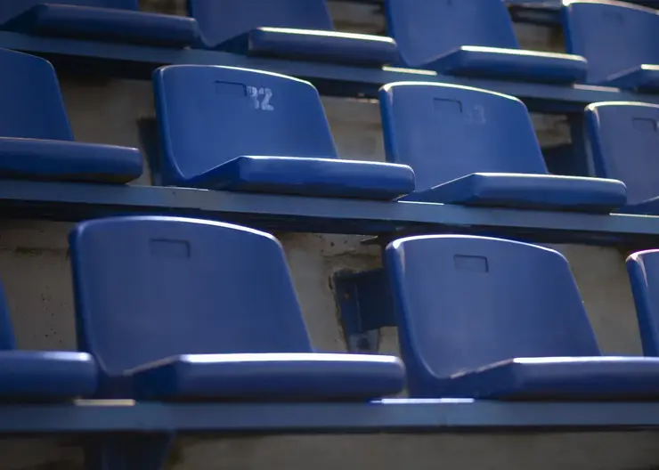 empty-blue-grandstands-low-angle