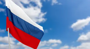https://ognikubani.ru/wp-content/uploads/2023/02/russian-flag-against-blue-sky_1