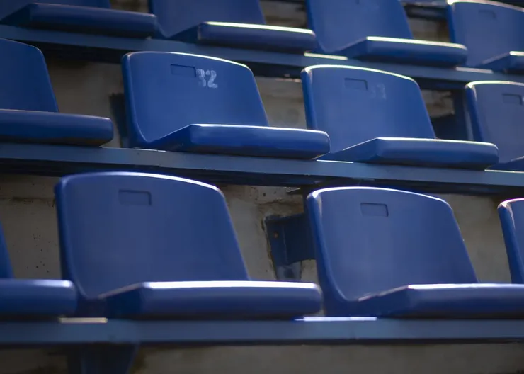 empty-blue-grandstands-low-angle