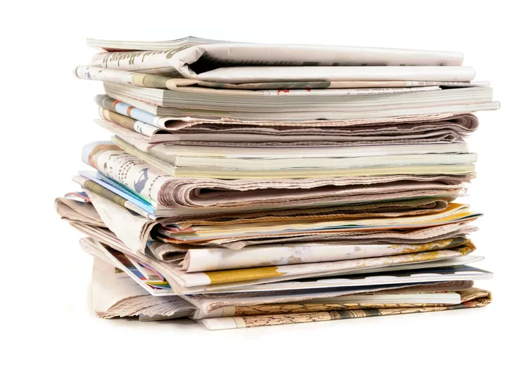 stack-old-newspapers-magazines